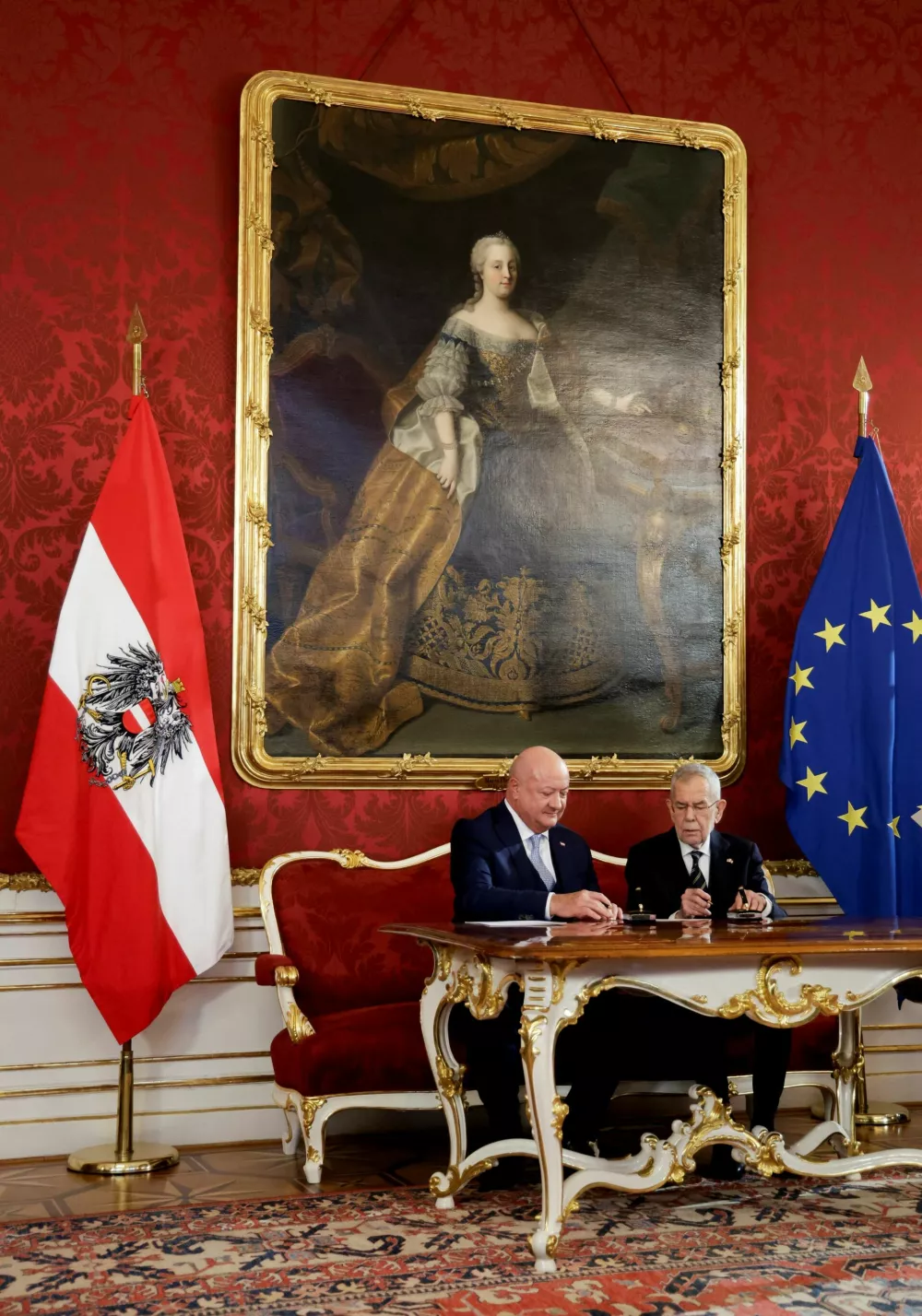 Austria's President Alexander Van der Bellen and head of People's Party (OeVP) and the new Chancellor Christian Stocker attend the swearing-in ceremony of a new government at Hofburg Palace in Vienna, Austria, March 3, 2025. REUTERS/Leonhard Foeger