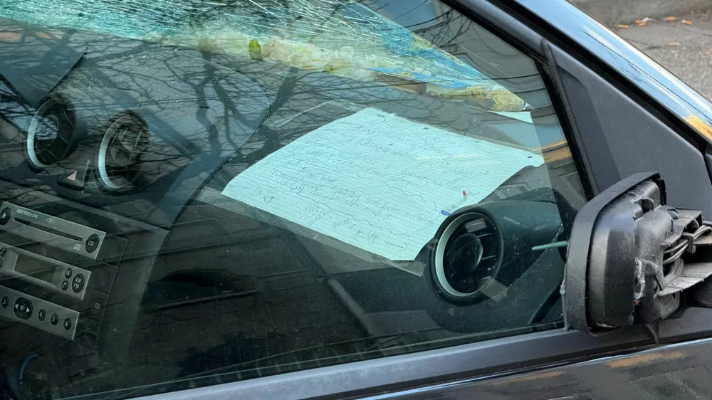 Handwritten notes on a piece of paper is attached to the dashboard of a vehicle which drove into a crowd, in Mannheim, Germany, March 3, 2025. REUTERS/Timm Reichert