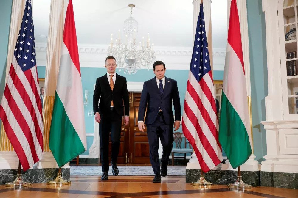 U.S. Secretary of State Marco Rubio meets with Hungarian Foreign Minister Peter Szijjarto at the State Department in Washington, D.C., U.S., March 4, 2025. REUTERS/Nathan Howard