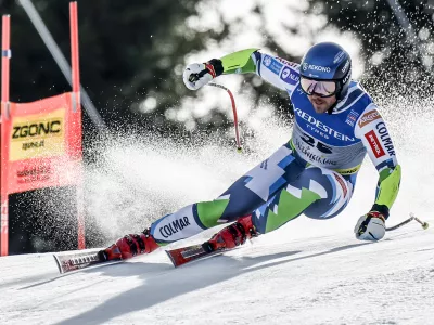 Slovenia's Miha Hrobat speeds down the course during a men's Super-G, at the Alpine Ski World Championships, in Saalbach-Hinterglemm, Austria, Friday, Feb. 7, 2025. (AP Photo/Gabriele Facciotti)