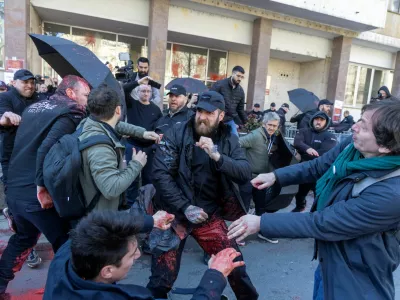 Belgrade City Hall security officials clash with people during the protest in Belgrade, Serbia, March 6, 2025. REUTERS/Djordje Kojadinovic
