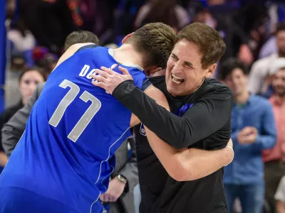 Nov 18, 2019; Dallas, TX, USA; Dallas Mavericks owner Mark Cuban hugs forward Luka Doncic (77) after the win over the San Antonio Spurs at the American Airlines Center. Mandatory Credit: Jerome Miron-USA TODAY Sports