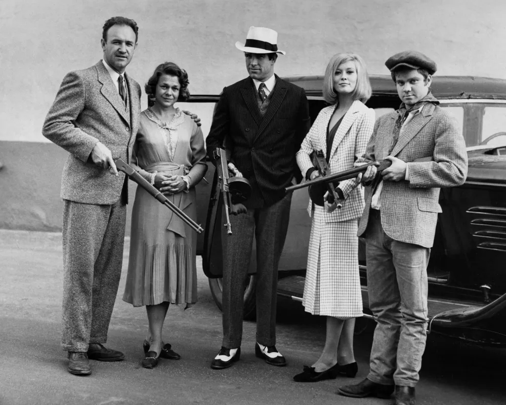 From left to right, actors Gene Hackman as Buck Barrow, Estelle Parsons as Blanche Barrow, Warren Beatty as Clyde Barrow, Faye Dunaway as Bonnie Parker and Michael J. Pollard as C. W. Moss in a publicity still for the film 'Bonnie and Clyde', 1967. (Photo by Silver Screen Collection/Getty Images)