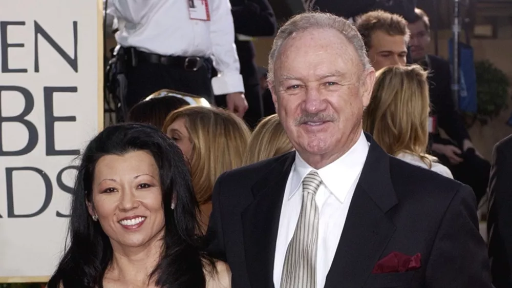 FILE - Actor Gene Hackman arrives with his wife, Betsy Arakawa, for the 60th Annual Golden Globe Awards in Beverly Hills, Calif., Sunday, Jan. 19, 2003. (AP Photo/Mark J. Terrill, File)