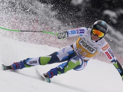 Slovenia's Ilka Stuhec speeds down the course of an alpine ski, women's World Cup super G race, in La Thuile, Italy, Thursday, March 13, 2025. (AP Photo/Piermarco Tacca)