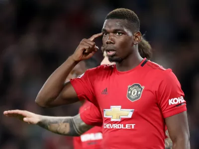 Soccer Football - Premier League - Wolverhampton Wanderers v Manchester United - Molineux Stadium, Wolverhampton, Britain - August 19, 2019  Manchester United's Paul Pogba reacts after Wolverhampton Wanderers' first goal  Action Images via Reuters/Carl Recine  EDITORIAL USE ONLY. No use with unauthorized audio, video, data, fixture lists, club/league logos or "live" services. Online in-match use limited to 75 images, no video emulation. No use in betting, games or single club/league/player publications. Please contact your account representative for further details.