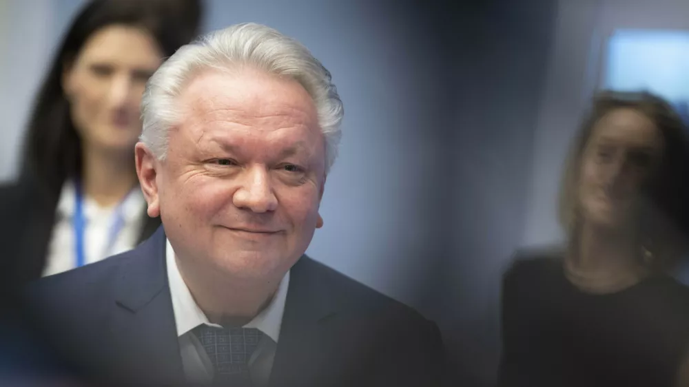 FILE - Armin Papperger, CEO of Rheinmetall, a German arms and automotive manufacturer, arrives to the company's launch event, to be included in the DAX, on the floor of the Frankfurt Stock Exchange in Frankfurt, Germany, on March 20, 2023. The German government said Friday July 12, 2024 that it "won't be intimidated" by Russian attempts to undermine the country's support of Ukraine, but refused to comment on a report that Moscow planned to assassinate Armin Papperger, the chief executive of a leading defense company. (Boris Roessler/dpa via AP, File)