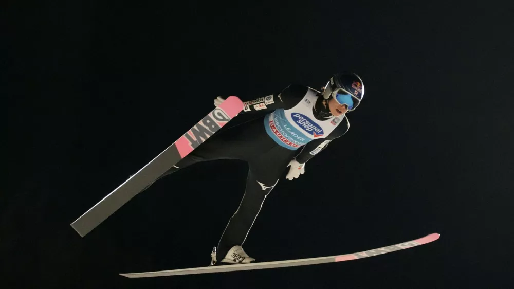Ryoyu Kobayashi of Japan soars through the air during the fourth stage of the 72th Four Hills ski jumping tournament in Bischofshofen, Austria, Friday, Jan. 5, 2024. (AP Photo/Matthias Schrader)