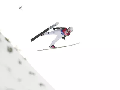 Nika Prevc, of Slovenia, soars through the air during her first round jump of the ski jumping women's large hill individual competition at the Nordic World Ski Championships in Trondheim, Norway, Friday, March 7, 2025. (AP Photo/Matthias Schrader)