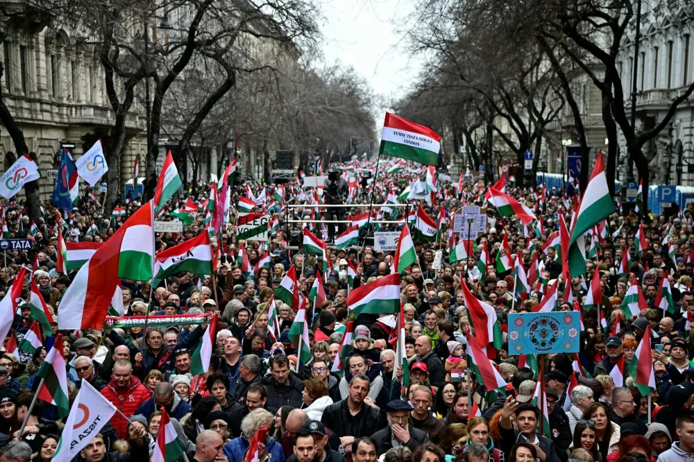 People gather to take part in the demonstration of opposition TISZA party during Hungary's National Day celebrations, which also commemorate the 1848 Hungarian Revolution against the Habsburg monarchy, in Budapest, Hungary, March 15, 2025. REUTERS/Marton Monus