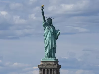 FILE - The Statue of Liberty is seen from the Staten Island Ferry, Monday, Sept. 9, 2024, in New York. (AP Photo/Pamela Smith, file)