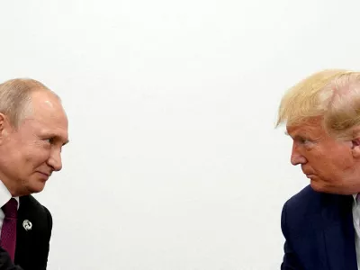 FILE PHOTO: U.S. President Donald Trump and Russian President Vladimir Putin hold a bilateral meeting at the G20 leaders summit in Osaka, Japan June 28, 2019. REUTERS/Kevin Lamarque/File Photo