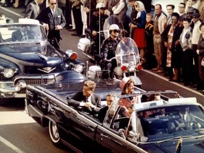 FILE PHOTO: November 22, 1993 will mark the 30th anniversary of the assassination of President John F. Kennedy. President and Mrs. John F. Kennedy, and Texas Governor John Connally ride through Dallas moments before Kennedy was assassinated, November 22, 1963/File Photo
