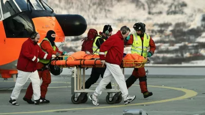 Rescue workers bring a survivor from the helicopter to the hospital in Tromso after six skiers were taken by an avalanche near Kaafjord in northern Norway on March 19, 2012. According to initial information to police, six people from a 12-member expedition apparently made up of French nationals were taken by an avalanche at around 2:30 pm (1330 GMT), at an altitude of about 1,000 metres (3,280 feet) on the Sorbmegaisa mountain in the Kaafjord municipality.,Image: 121810320, License: Rights-managed, Restrictions: NORWAY OUT, Model Release: noFoto: Profimedia