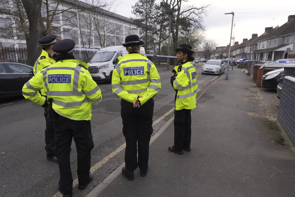 Police forces cordon off the area around the North Hyde electrical substation, which caught fire Thursday night and lead to a closure of Heathrow Airport in London, Friday, March 21, 2025.(AP Photo/Kirsty Wigglesworth)