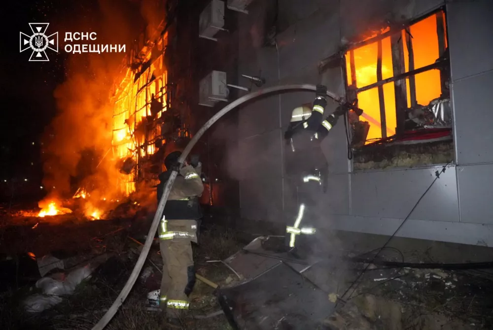 Firefighters work at a site of a Russian drone strike, amid Russia's attack on Ukraine, in Odesa, Ukraine in this handout picture released March 21, 2025. Press service of the State Emergency Service of Ukraine in Odesa region/Handout via REUTERS ATTENTION EDITORS - THIS IMAGE HAS BEEN SUPPLIED BY A THIRD PARTY. WATERMARK FROM SOURCE. MANDATORY CREDIT.