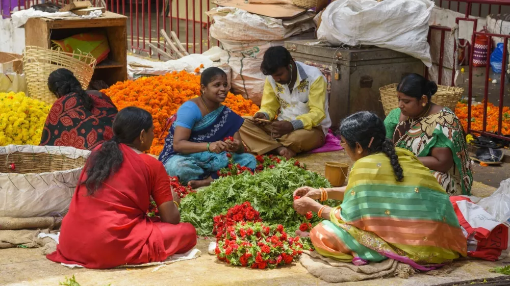 Women working at flower stall at K. R. Market in Banaglore, Karnataka, India, Asia,Image: 890388304, License: Royalty-free, Restrictions: Editorial Use Only, Model Release: no