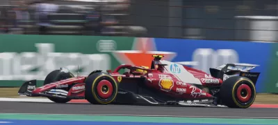 Ferrari driver Lewis Hamilton of Britain steers his car during the sprint race ahead of the Chinese Formula One Grand Prix at the Shanghai International Circuit, Shanghai, Saturday, March 22, 2025. (AP Photo)