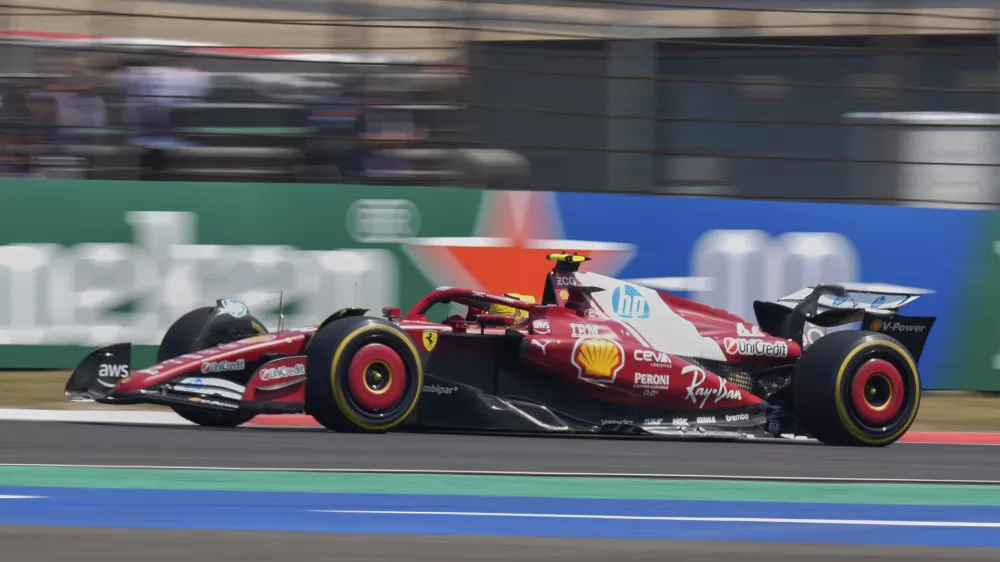 Ferrari driver Lewis Hamilton of Britain steers his car during the sprint race ahead of the Chinese Formula One Grand Prix at the Shanghai International Circuit, Shanghai, Saturday, March 22, 2025. (AP Photo)