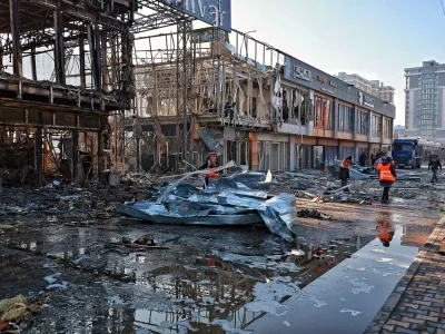 21 March 2025, Ukraine, Odesa: Firefighters work at the scene of a fire caused by a Russian drone strike in Odesa. Photo: -/Ukrinform/dpa