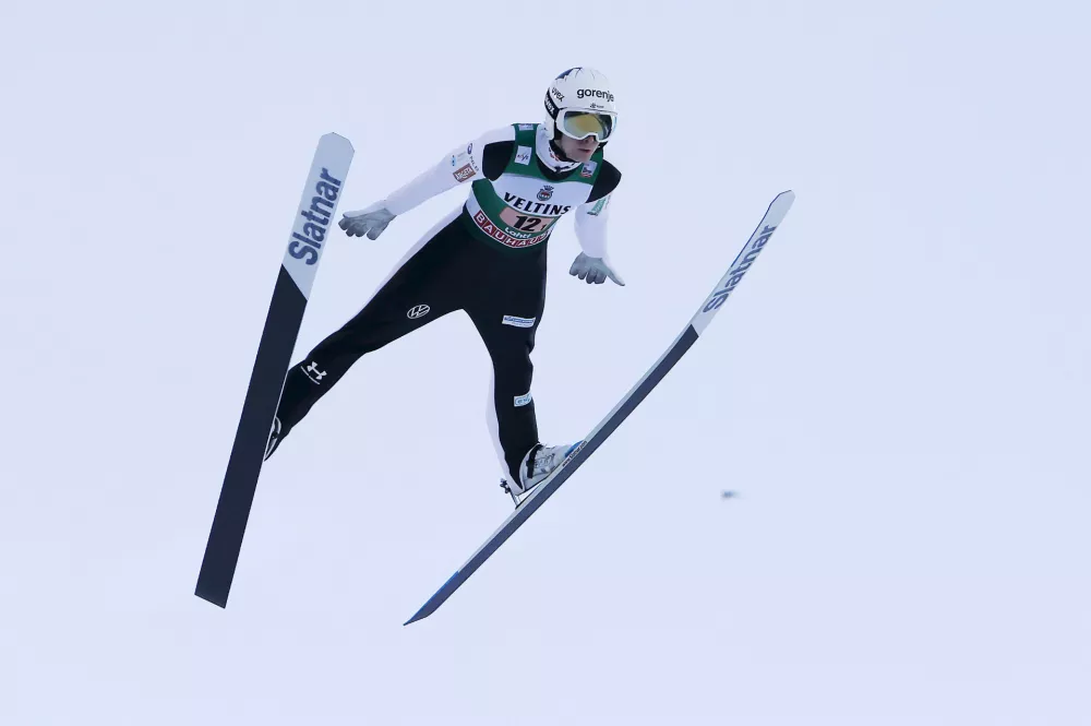 Lovro Kos of Slovenia competes in the men's ski jumping Super Team Large Hill HS130 competition at the FIS Nordic World Cup Lahti Ski Games, in Lahti, Finland, Sunday March 23, 2025. (Pepe Korteniemi/Lehtikuva via AP)