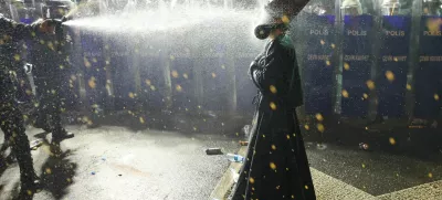 Police officers use pepper spray on a demonstrator wearing dervish clothes, during a protest on the day Istanbul Mayor Ekrem Imamoglu was jailed as part of a corruption investigation, in Istanbul, Turkey, March 23, 2025. REUTERS/Umit Bektas