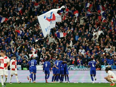 Soccer Football - Nations League - Quarter Final - Second Leg - France v Croatia - Stade de France, Saint-Denis, France - March 23, 2025 France's Ousmane Dembele celebrates scoring their second goal with teammates REUTERS/Sarah Meyssonnier