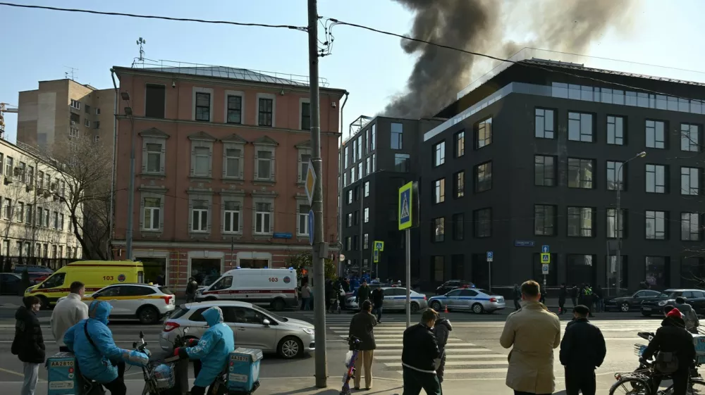 8886696 24.03.2025 People gather near the Roza Rossa residential complex where a fire broke out, on the Zubovskaya Street in Moscow, Russia. The roof of a five-story building burst into flames on an area of about 100 square meters.,Image: 978925615, License: Rights-managed, Restrictions: Editors' note: THIS IMAGE IS PROVIDED BY RUSSIAN STATE-OWNED AGENCY SPUTNIK., Model Release: noFoto: Profimedia