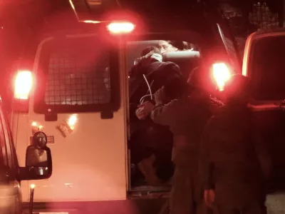 CORRECTS DATE: Hamdan Ballal, Palestinian co-director of Oscar-winning documentary No Other Land, is detained by the Israeli military from his home in the Israeli-occupied West Bank, Monday March 24, 2025. (Raviv Rose via AP)