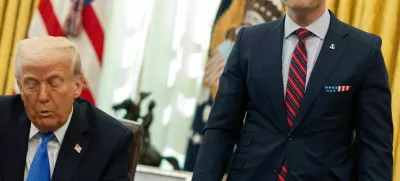 U.S. Defense Secretary Pete Hegseth stands by U.S. President Donald Trump, in the Oval Office at the White House, in Washington, D.C., U.S., March 21, 2025. REUTERS/Carlos Barria