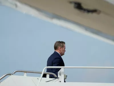 U.S. National Security Advisor Mike Waltz boards Air Force One as U.S. President Donald Trump departs for Florida, at Joint Base Andrews, Maryland, U.S., April 3, 2025. REUTERS/Kent Nishimura