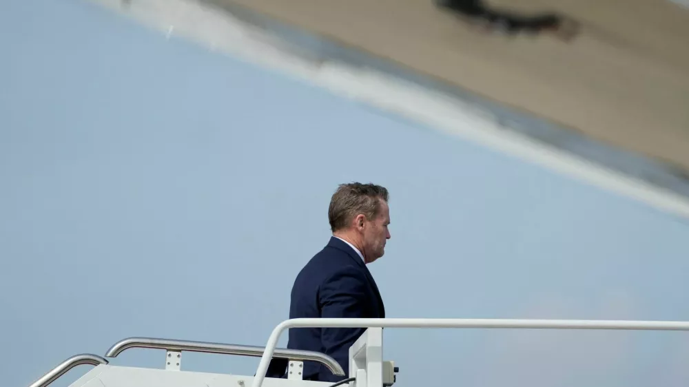 U.S. National Security Advisor Mike Waltz boards Air Force One as U.S. President Donald Trump departs for Florida, at Joint Base Andrews, Maryland, U.S., April 3, 2025. REUTERS/Kent Nishimura