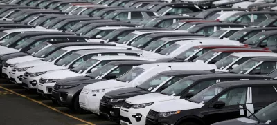 FILE PHOTO: FILE PHOTO: New Land Rover cars are seen in a parking lot at the Jaguar Land Rover plant at Halewood in Liverpool, northern England, September 12, 2016. REUTERS/Phil Noble/File PhotoGLOBAL BUSINESS WEEK AHEAD/File Photo