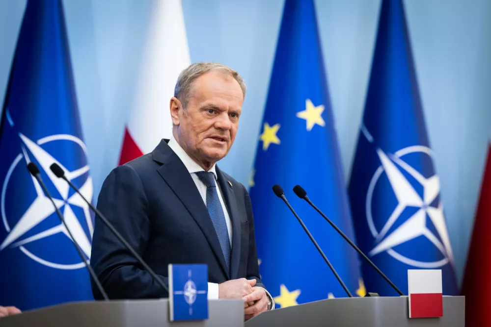 HANDOUT - 26 March 2025, Poland, Warsaw: Poland's Prime Minister Donald Tusk speaks during a joint press conference with NATO Secretary General Mark Rutte, following their meeting in Warsaw. Photo: -/NATO /dpa - ATTENTION: editorial use only and only if the credit mentioned above is referenced in full