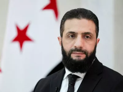 FILE PHOTO: Syria's interim President Ahmed al-Sharaa attends an interview with Reuters at the presidential palace, in Damascus, Syria March 10, 2025. REUTERS/Khalil Ashawi/File Photo