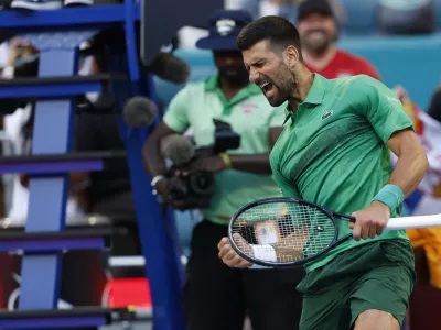 Mar 27, 2025; Miami, FL, USA; Novak Djokovic (SRB) celebrates after his match against Sebastian Korda (USA)(not pictured) in a men's singles quarterfinal on day ten of the Miami Open at Hard Rock Stadium. Mandatory Credit: Geoff Burke-Imagn Images