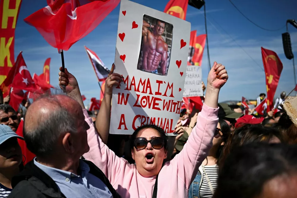 People take part in a rally to protest against the arrest of Istanbul Mayor Ekrem Imamoglu as part of a corruption investigation, in Istanbul, Turkey, March 29, 2025. REUTERS/Dylan Martinez