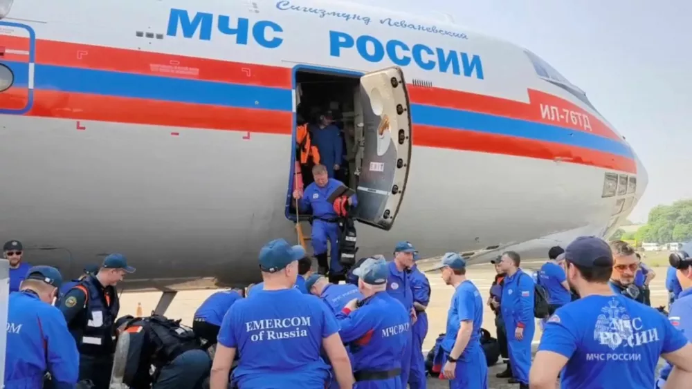 Members of Russian Emergencies Ministry disembark from a plane after landing in Naypyidaw, Myanmar, in this still image from video released March 30, 2025. Russian Emergencies Ministry/Handout via REUTERS ATTENTION EDITORS - THIS IMAGE HAS BEEN SUPPLIED BY A THIRD PARTY. NO RESALES. NO ARCHIVES. MANDATORY CREDIT. WATERMARK FROM SOURCE.