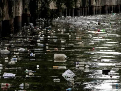FILE PHOTO: Plastic bottles float on the heavily polluted San Juan River, a tributary of Pasig River in Mandaluyong City, Philippines, June 21, 2021. REUTERS/Eloisa Lopez