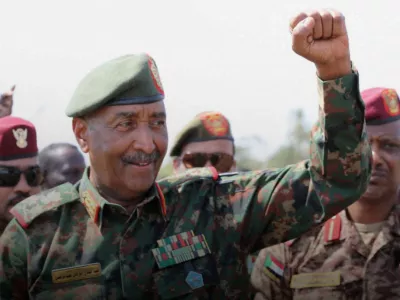 FILE PHOTO: Sudan's army chief Abdel Fattah al-Burhan gestures to soldiers inside the presidential palace after the Sudanese army said it had taken control of the building, in the capital Khartoum, Sudan March 26, 2025. Sudan Transitional Sovereignty Council/Handout via REUTERS  THIS IMAGE HAS BEEN SUPPLIED BY A THIRD PARTY/File Photo