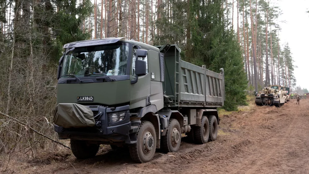 A view shows a military vehicle at the scene of a rescue operation at Pabrade training ground, in Lithuania, March 31, 2025. Lithuanian Armed Forces/Handout via REUTERS ATTENTION EDITORS - THIS IMAGE HAS BEEN SUPPLIED BY A THIRD PARTY. NO RESALES. NO ARCHIVES. MANDATORY CREDIT