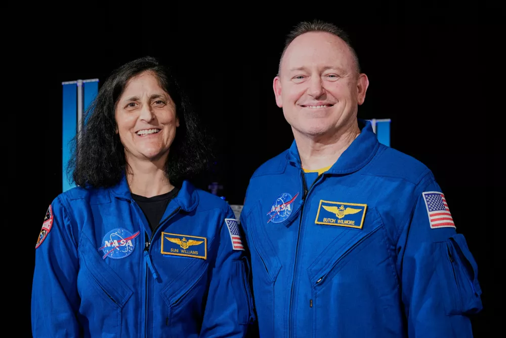 Astronauts Suni Williams, left, and Butch Wilmore pose for a photo at Johnson Space Center on Monday, March 31, 2025, in Houston. (AP Photo/Ashley Landis)