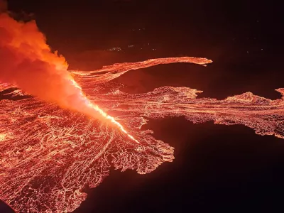 Lava spurts and flows after the eruption of a volcano in the Reykjanes Peninsula near Grindavik, Iceland, in this handout picture released on November 21, 2024. Civil Protection of Iceland/Handout via REUTERS  THIS IMAGE HAS BEEN SUPPLIED BY A THIRD PARTY. NO RESALES. NO ARCHIVES. MANDATORY CREDIT.