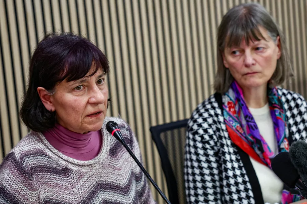 Former religious sisters Gloria Branciani and Mirjam Kovac who say they have endured various kinds of abuse by world-renowned religious artist Father Marko Rupnik, appear publicly for the first time holding a press conference in Rome, Italy February 21, 2024. REUTERS/Guglielmo Mangiapane