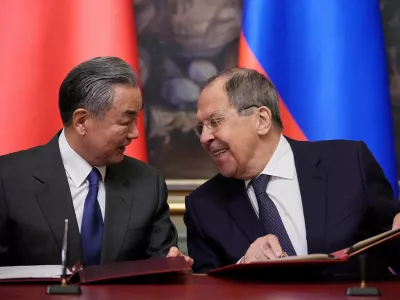 Russian Foreign Minister Sergei Lavrov and Chinese Foreign Minister Wang Yi speak during a signing ceremony following their talks in Moscow, Russia, April 1, 2025. Pavel Bednyakov/Pool via REUTERS