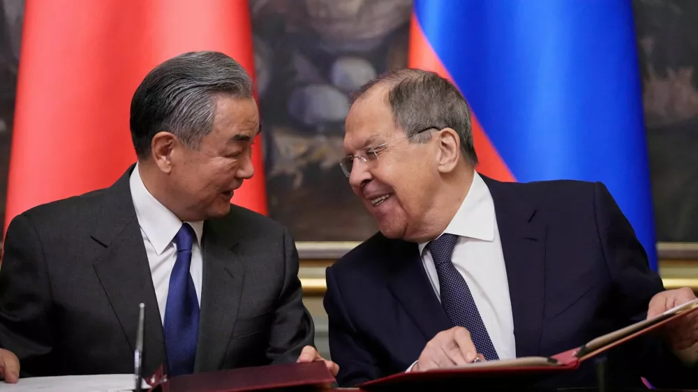 Russian Foreign Minister Sergei Lavrov and Chinese Foreign Minister Wang Yi speak during a signing ceremony following their talks in Moscow, Russia, April 1, 2025. Pavel Bednyakov/Pool via REUTERS