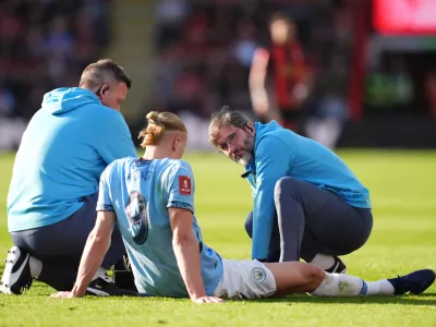 30 March 2025, United Kingdom, Bournemouth: Manchester City's Erling Haaland receives treatment on the ground during the English FA Cup quarter final soccer match between AFC Bournemouth and Manchester City at the Vitality Stadium. Photo: Adam Davy/PA Wire/dpa