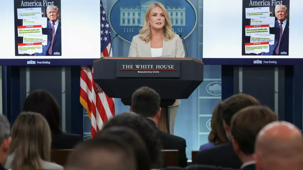 White House Press Secretary Karoline Leavitt holds a press briefing, as headlines from articles on U.S. President Donald Trump's tariffs are displayed, at the White House in Washington, D.C., U.S April 1, 2025. REUTERS/Carlos Barria