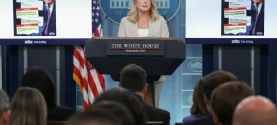 White House Press Secretary Karoline Leavitt holds a press briefing, as headlines from articles on U.S. President Donald Trump's tariffs are displayed, at the White House in Washington, D.C., U.S April 1, 2025. REUTERS/Carlos Barria