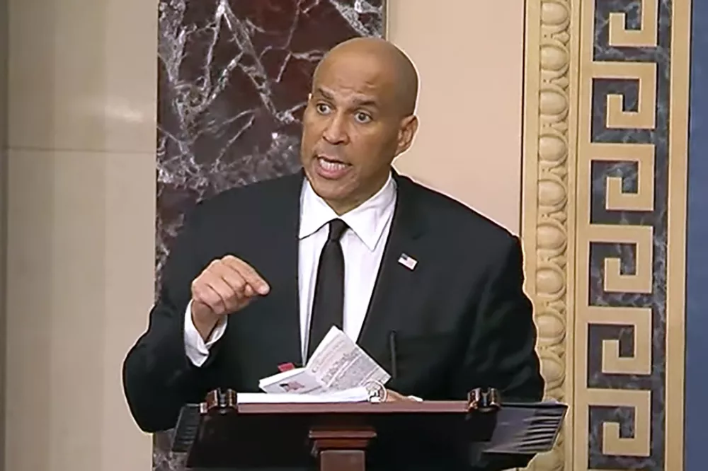 In this image provided by Senate Television, Sen, Cory Booker, D-N.J. speaks on the Senate floor, Tuesday morning, April 1, 2025. (Senate Television via AP)